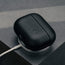 Black Leather AirPods Pro (3rd Gen) Case on MagSafe charger
