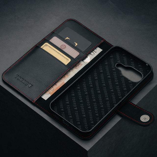 Card slots and microfibre lined frame of the Black with Red Detail Leather Wallet Case for Google Pixel 9