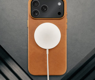 MagSafe charger attached to the Slimline Light Brown / Tan Leather Bumper Case for iPhone 17 Pro