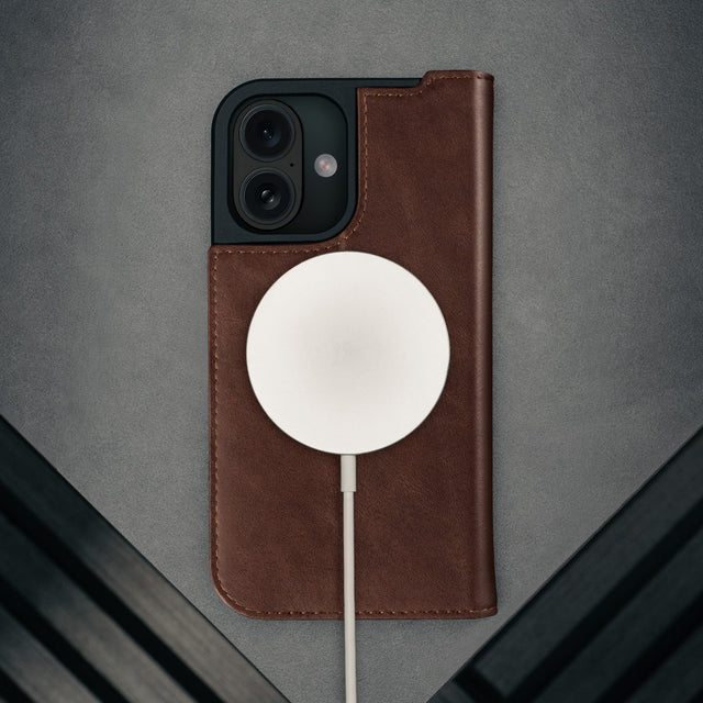 MagSafe charger attached to the Dark Brown Leather Case for iPhone 17