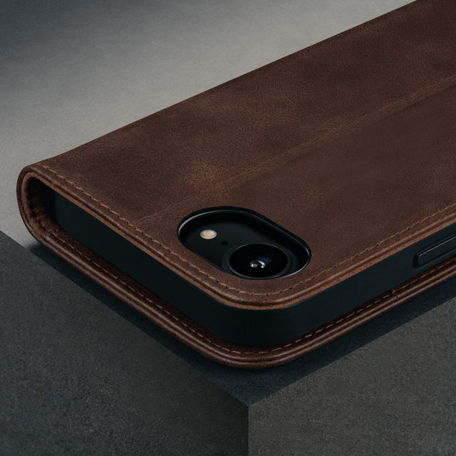 Camera cutout on the Dark Brown Leather Wallet Case for iPhone SE4 (2025)