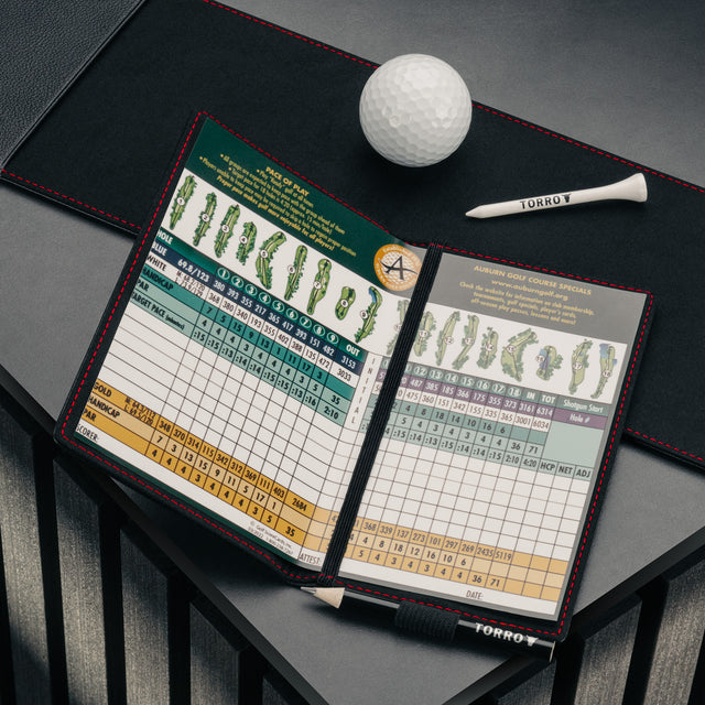 Golf scorecard in the PRO Edition of the Black with Red Detail Leather Golf Scorecard & Yardage Book Holder