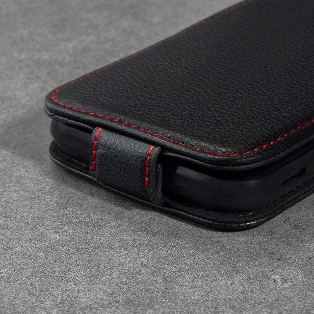 Magnetic closure tab on the Black Leather (with Red Stitching) Flip Case for iPhone SE & iPhone 7/8