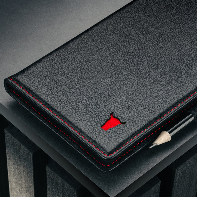 Holding the Black with Red Detail Leather Golf Scorecard Holder